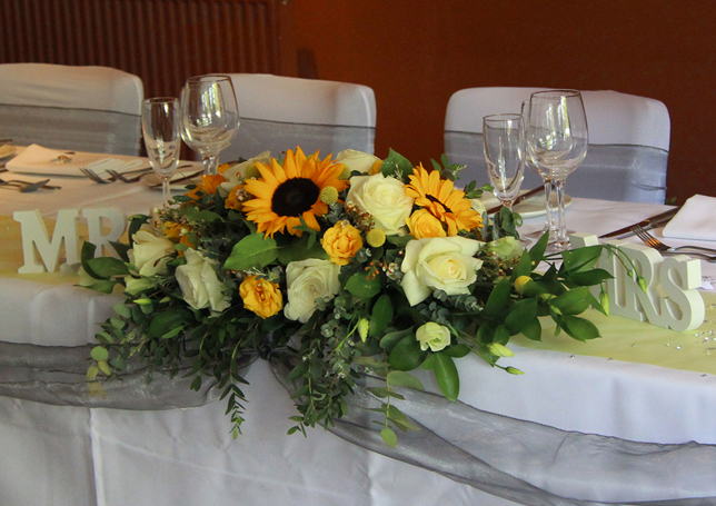 Wedding Top table flowers with Sunflowers