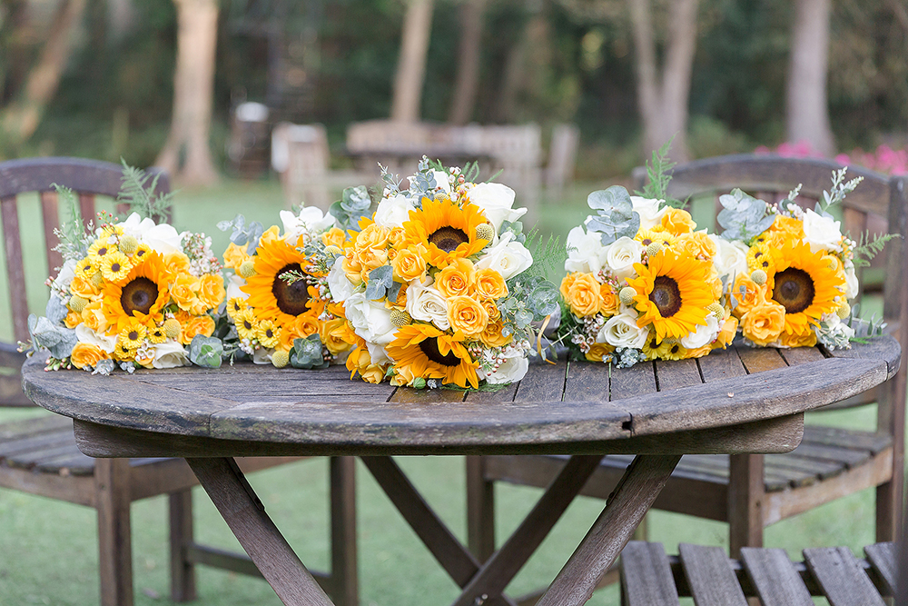 Sunflower bouquets we provided for a wedding in October 2017, 4 x bridesmaids and also the brides larger bouquet all hand tied in the centre.  Photo Credit - Photography by Ellie Jayne