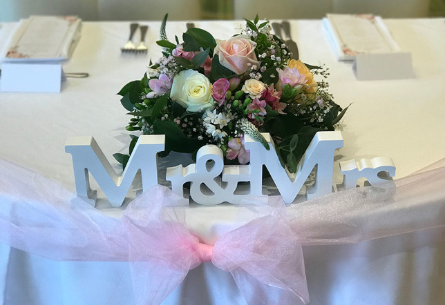 Pink top table wedding flowers - Marriott meon valley