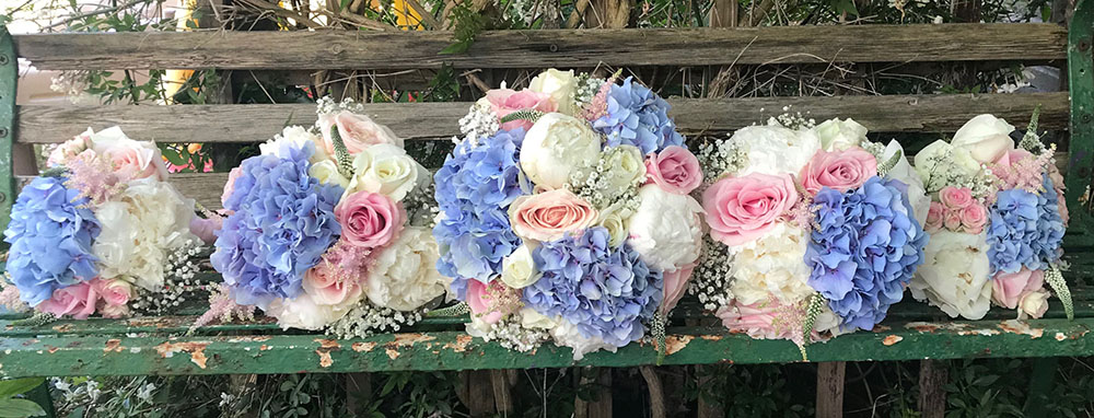 Brides bouquet an larger bridesmaids bouquets