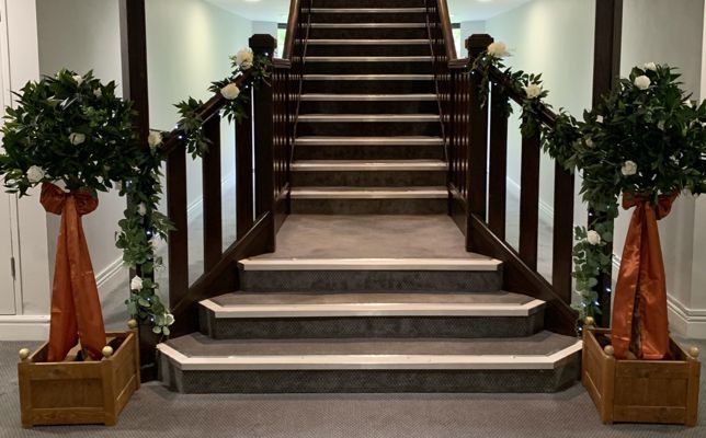 Holiday inn - Burnt orange - Tom and julia - stairs.jpg